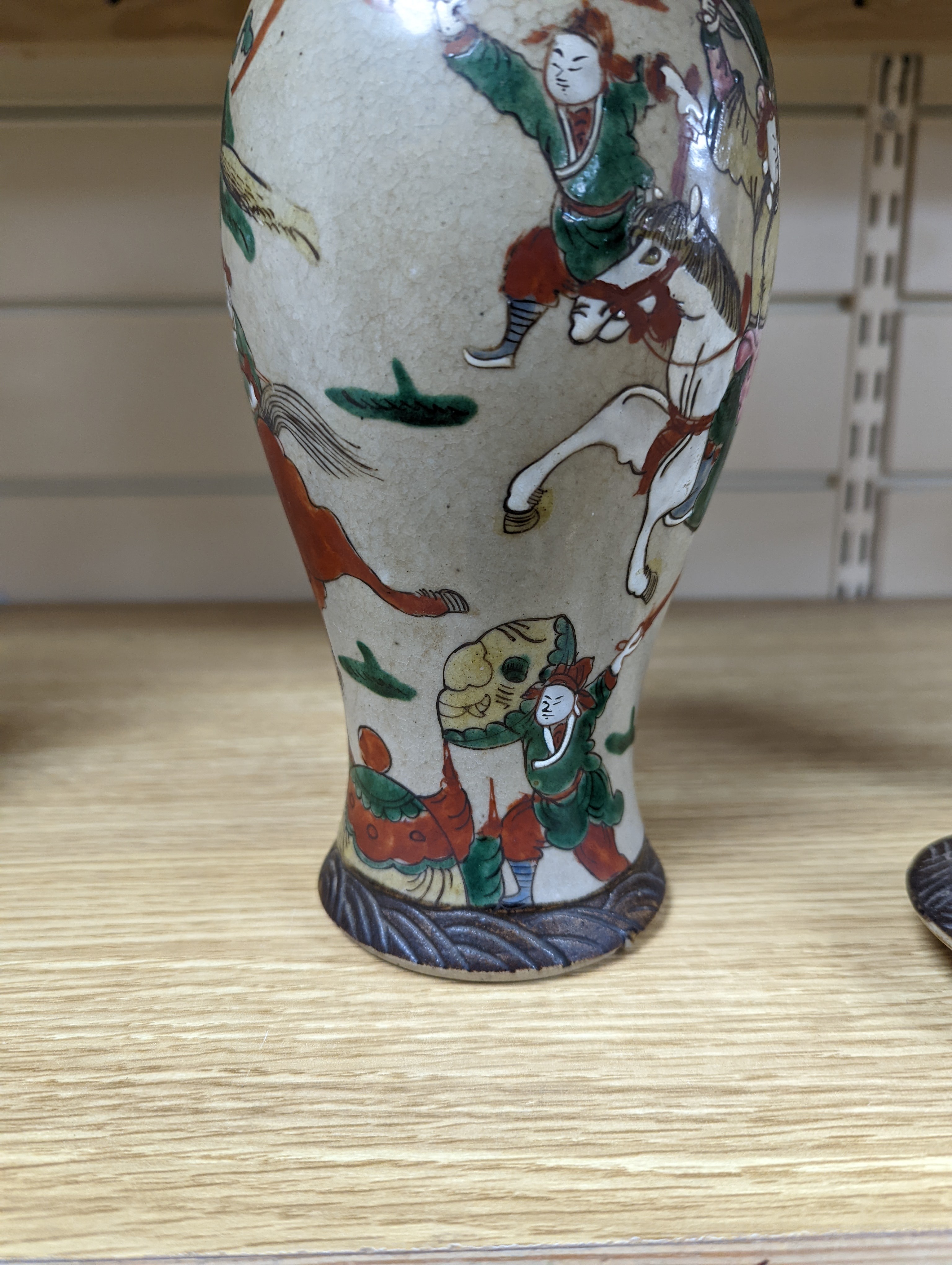 A late 19th century Chinese crackle glaze famille rose baluster vase and cover 30cm